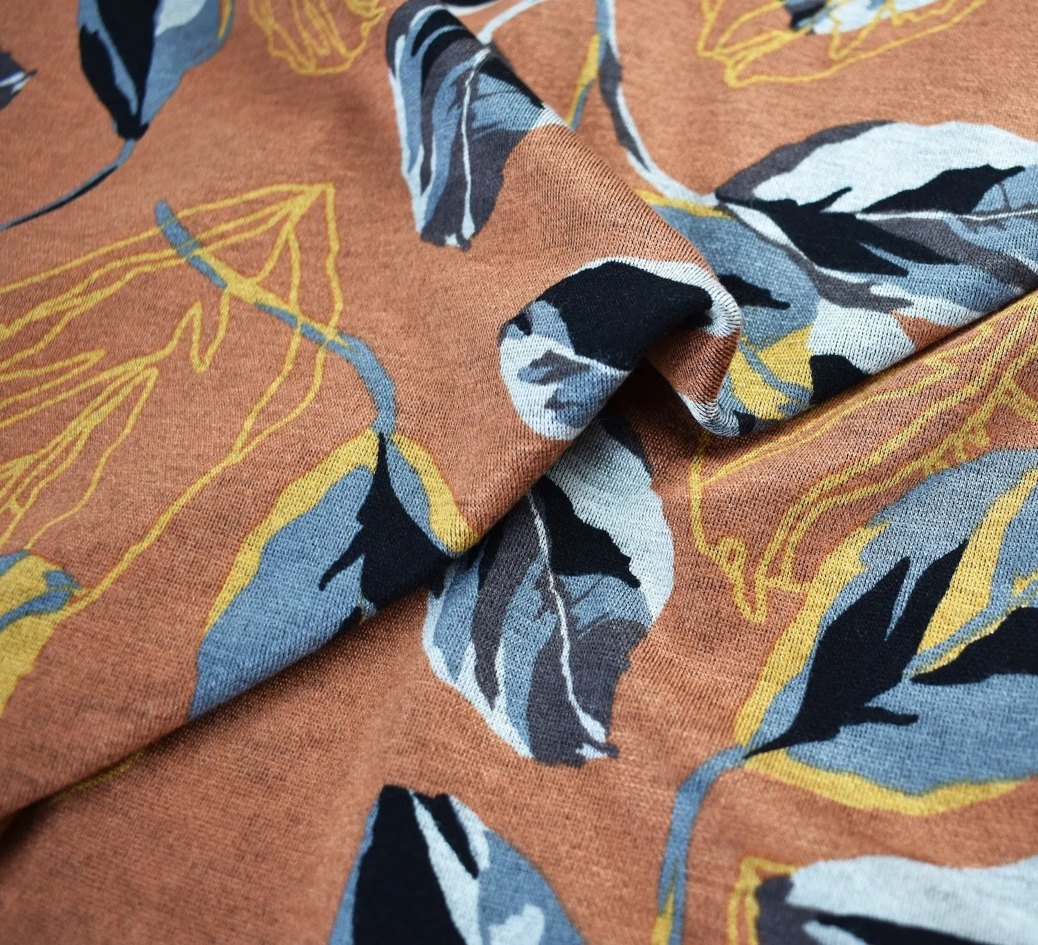 Drifting Leaves Viscose Ponte Roma Fabric - Orange