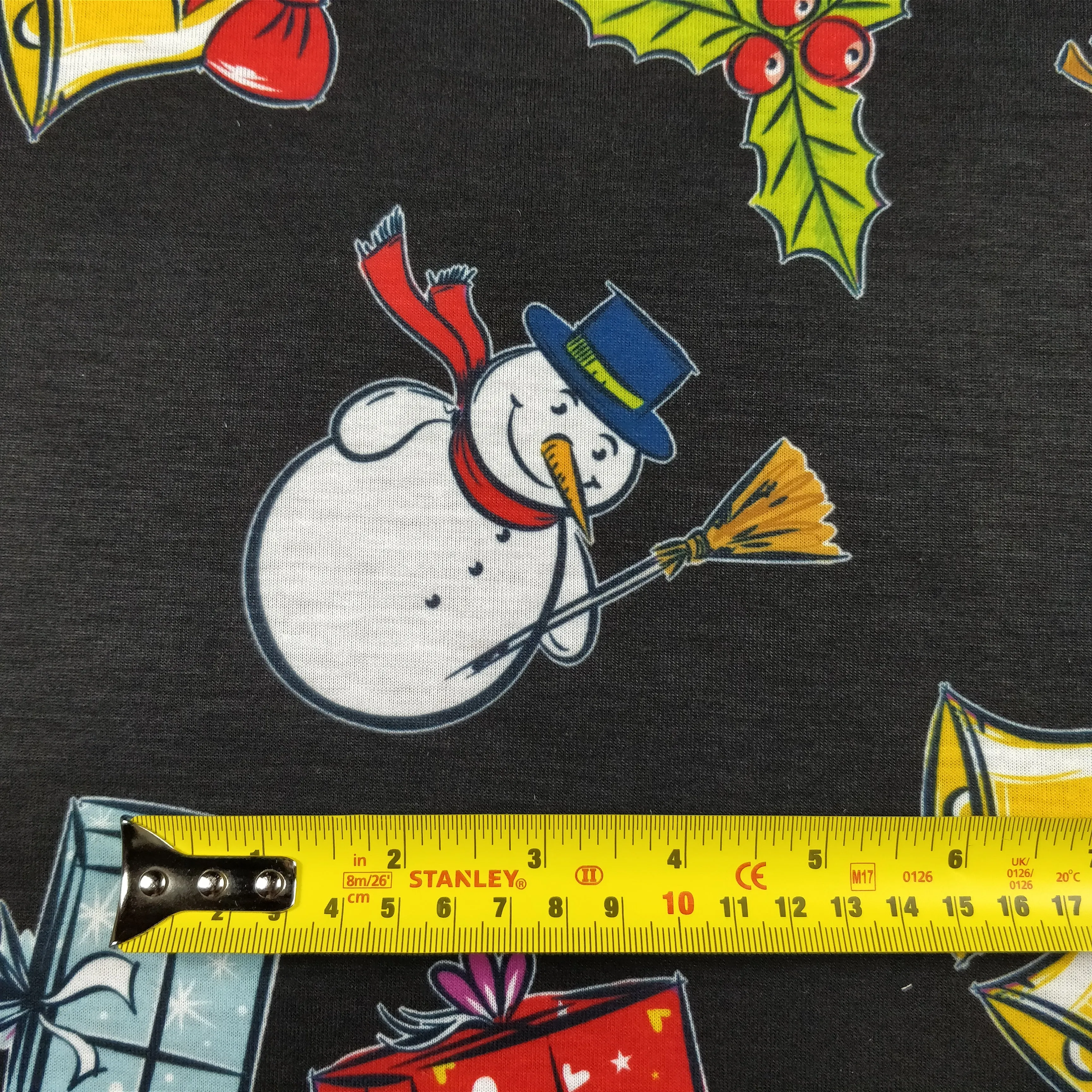 FS151 Snowman Bells Print Black Spun Polyester Knit Stretch Fabric Black