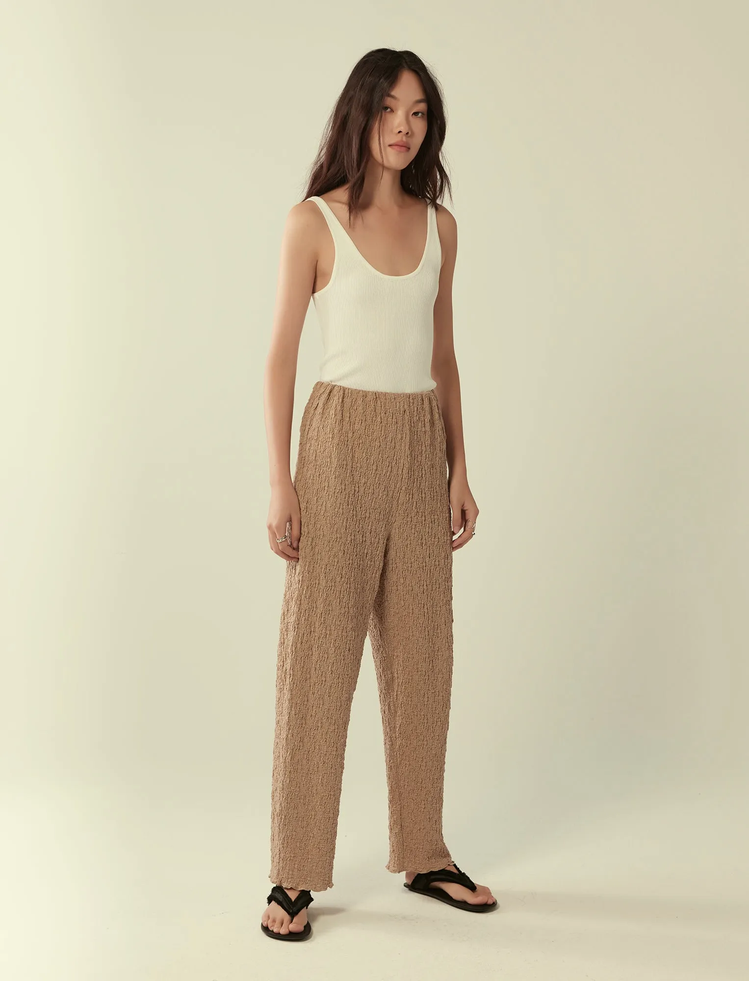 straight-leg crinkled trousers