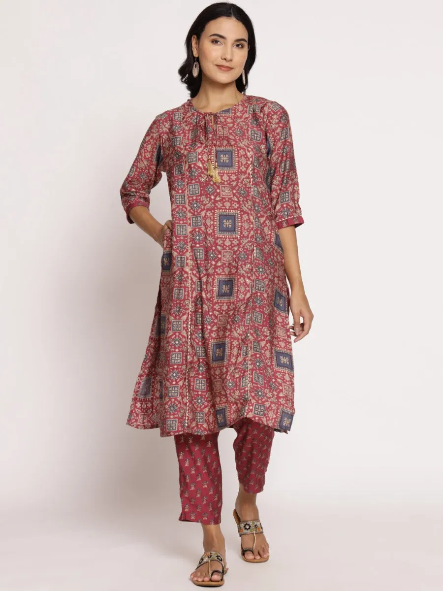 Women Dark Onion Pink Ornamental Printed Kurta With Trouser